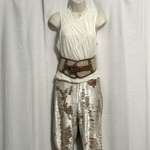 Mesh ivory sleeveless high neck blouse.